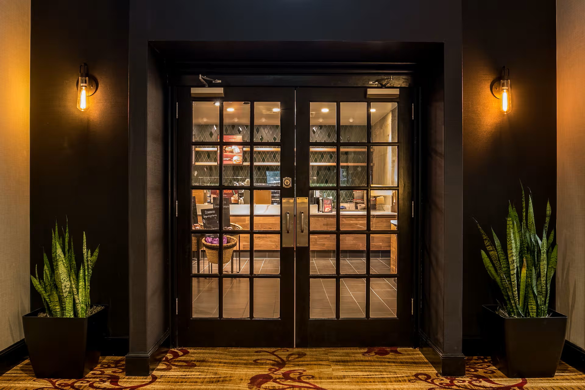 FW Hilton hotel-entrance-to-starbucks-with-logo